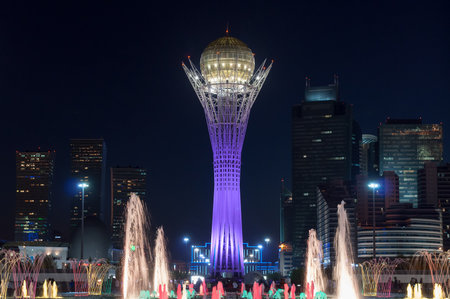 ASTANA, KAZAKHSTAN - MAY 9, 2014: Bayterek Tower and  fountain show at night. Bayterek is a monument and observation tower in Astana. The height of buildings 105 metersのeditorial素材