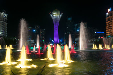 ASTANA, KAZAKHSTAN - MAY 9, 2014: Bayterek Tower and  fountain show at night. Bayterek is a monument and observation tower in Astana. The height of buildings 105 metersのeditorial素材