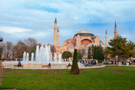 ISTANBUL, TURKEY, DEC 4, 2014: Aghia Sophia with fountain in square. Hagia Sophia is a former Greek Orthodox church, later an imperial mosque, and now a museumin Istanbul.のeditorial素材