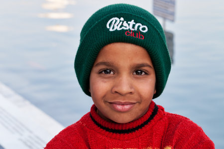 AMRITSAR, INDIA, DEC - 7, 2014: Unidentified Indian Sikh boy in Golden Temple (Harmandir Sahib also Darbar Sahib). Golden Temple is the holiest Sikh gurdwara located in the city of Amritsar, Punjab, India.のeditorial素材