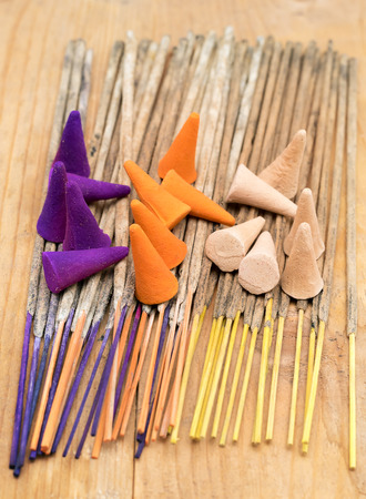 Colorful incense sticks and incense conesの写真素材