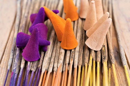 Colorful incense sticks and incense conesの写真素材