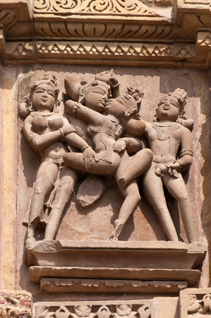 Stone carved erotic sculptures on Kandariya Mahadeva temple. Western temples of Khajuraho. Madhya Pradesh. India. Built around 1029の写真素材