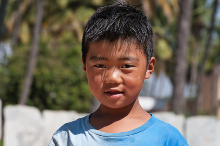 BANGALORE, INDIA - DEC 26, 2014: Portrait of unidentified Indian boy on the street in Bangaloreのeditorial素材