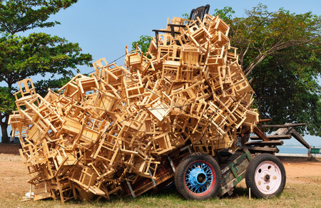 Fort Kochi, India - Jan 7, 2015: Installation of Carriers of Democracy from wood, metal, rubher tyres, rope, jute. Mansoor Aliのeditorial素材