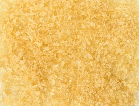 Yellow gelatin granules crystals. background textureの写真素材