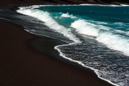 Black sand volcanic beach in Tangkoko National Park. North Sulawesi. Indonesiaの写真素材