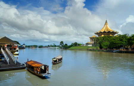 Kuching, Malaysia - Dec 30, 2015: Traditional boats on Sarawak river from waterfront in Kuching city. Sarawak. Borneo.のeditorial素材
