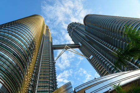 Kuala Lumpur, Malaysia -January 7, 2016: View of Petronas Twin Towers in sunlight. The skyscraper...