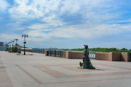 Astrakhan, Russia - September 05, 2016: Sculpture Lady with the Dog. Monument is on the Volga embankmentのeditorial素材