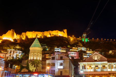 Tbilisi, Georgia - September 24, 2016: Viev of Old city with shops, restaurants and cafes at nightのeditorial素材