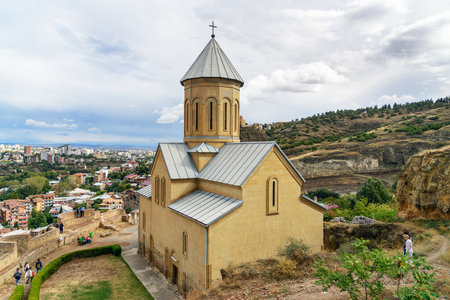 Tbilisi, Georgia - September 24, 2016: Saint Nicholas church in Narikala fortress and view of city Tbilisiのeditorial素材