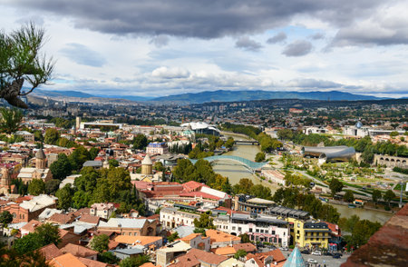 Tbilisi, Georgia - September 24, 2016: View of city center Tbilisi with Rike Park, river Kura, Bridge of Peace, Old city and other famous landmarksのeditorial素材