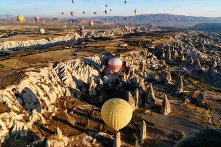 Goreme, Turkey - October 16, 2016: Hot air balloons flying over valley of Cappadocia in the morning. Nevsehir Province. Turkey.のeditorial素材