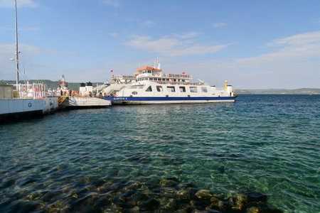 Canakkale, Turkey - October 31, 2016: View of Canakkale ferry pier and boat. Asian side of the city on coast of the Dardanellesのeditorial素材