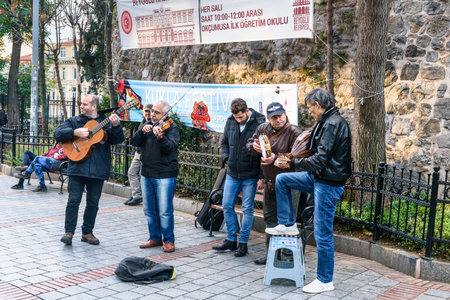 Istanbul, Turkey - November 01, 2016: Group of musicians playing on the street near Galata towerのeditorial素材