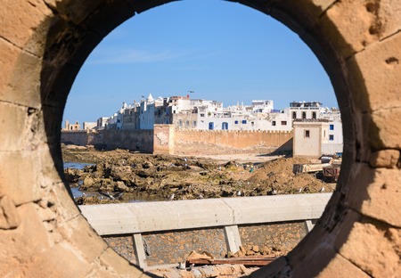 View of Essaouira old city through hole in wall of fortress. Moroccoの写真素材