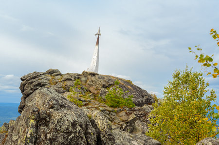 Stella rocket on a rock in honor of Gagarin's flight. Established in 1961 on mountain Kachkanar. Sverdlovsk region. The Urals. Russiaのeditorial素材