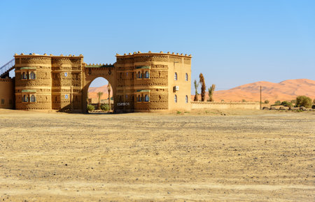 Merzouga, Morocco - Jan 6, 2017: View on Hotel Ksar Bicha near Erg Chebbi Sand dunes in Sahara Desertのeditorial素材