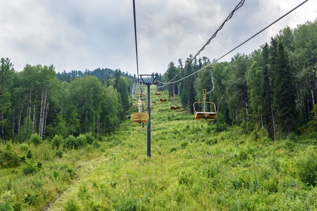 Chairlift ski lift on Kokuya Mountain. Artybash village. Altai Republic, Siberia. Russia