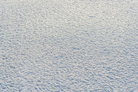 Winter white ice on the sun. background textureの写真素材