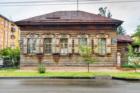 Irkutsk, Russia - August 14, 2017: View of old wooden houses on the street in historic center of the cityのeditorial素材