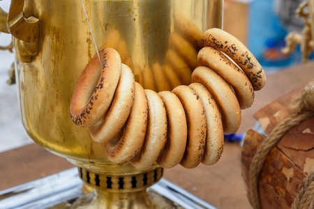 Russian samovar with tea and bagels on the street in winterの写真素材