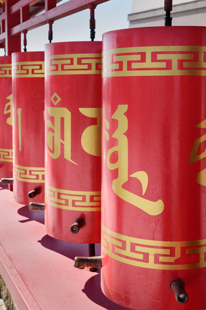 Prayer wheels in Buddhist complex Golden Abode of Buddha Shakyamuni. Elista. Kalmykia. Russiaの写真素材