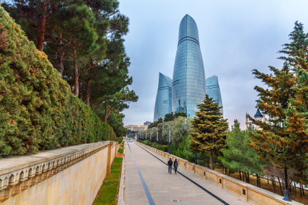 Baku, Azerbaijan - March 11, 2018: View on Flame Towers from park in the evening. Towers consist of three buildings: south, east and west. Height of 190 mのeditorial素材