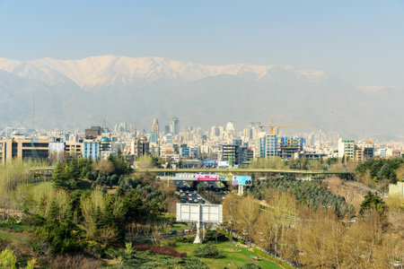 Tehran, Iran - March 19, 2018: View of Tehran city and Alborz Mountains, Modares highway and Abo Atash bridge from Tabiat Bridgeのeditorial素材