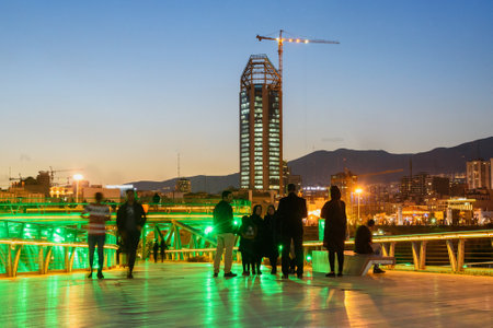 Tehran, Iran - March 18, 2018: Iranian people walk on Tabiat Bridge at night