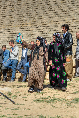 Lorestan Province, Iran - April 1, 2018: Iranian women dancing Lurish Cupi dances on wedding ceremony in the village.のeditorial素材