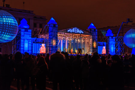 Saint Petersburg, Russia - January 1, 2018: Christmas party on Palace square on New Year's night. People celebrate on the streetのeditorial素材