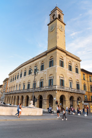 Pisa, Italy - September 24, 2018: Clock Tower on the bank of Arno riverのeditorial素材