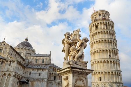 Putti Fountain and Leaning Tower in Pisa, Italyの写真素材