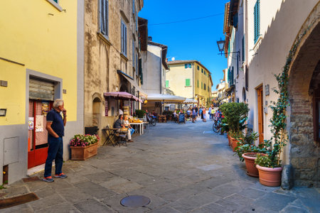 Castellina in Chianti, Italy - September 29, 2018: On the street in old medieval village Castellina in Chiantiのeditorial素材