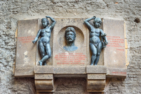 Rome, Italy - October 04, 2018: Bust of the poet Giggi Zanazzo Via dei Delfini on the wallのeditorial素材