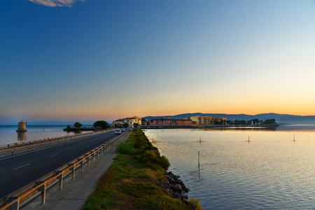 View of Orbetello in lagoon on peninsula Argentario at sunrise. Tuscany. Italyの写真素材