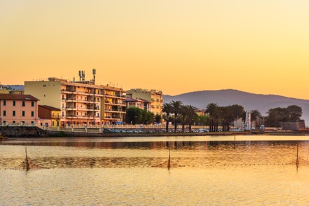 View of Orbetello in lagoon on peninsula Argentario at sunrise. Tuscany. Italyの写真素材