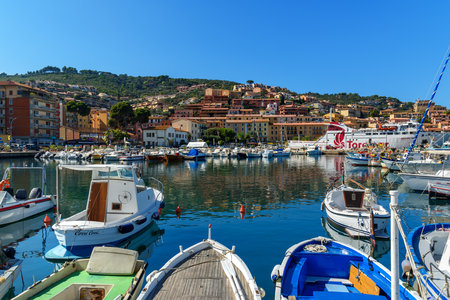 Porto Santo Stefano, Italy - October 09, 2018: View of harbor seafront in seaport town Porto Santo Stefano in Monte Argentario. Tuscanyのeditorial素材