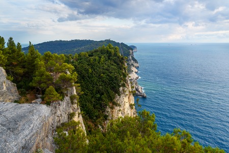 Cliff sea coast from Muzzerone mountain. Portovenere or Porto Venere town on Ligurian coast. Province of La Spezia. Italyの写真素材