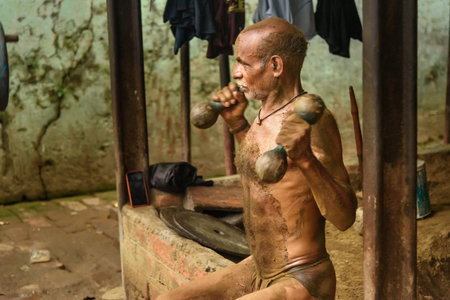 Kolkata, India - March 14, 2019: Kushti wrestler on daily trainining in akhara. Kushti or Pehlwani is traditional form of wrestling in India.のeditorial素材