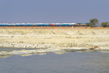 Sambhar, India - February 03, 2019: Indian train on railway near Sambhar Salt Lake. Rajasthanのeditorial素材