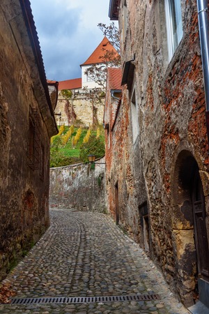 Narrow street from Castle in old town of Ptuj in Sloveniaの写真素材