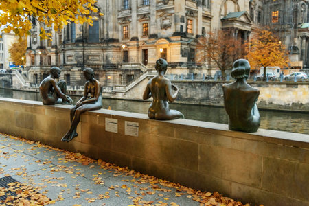 Berlin, Germany - November 08, 2018: Sculpture Bathers on the Spree, Three Girls and a Boy by Wilfried Fitzenreiter were made from 1977-1979のeditorial素材