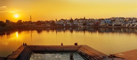 Panorama of Ghats at Pushkar holy lake on sunset in Rajasthan. Indiaの写真素材
