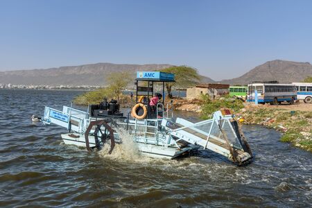 Ajmer, India - February 07, 2019: Lake cleaning machine on Lake Anasagar in Ajmer. Rajasthan