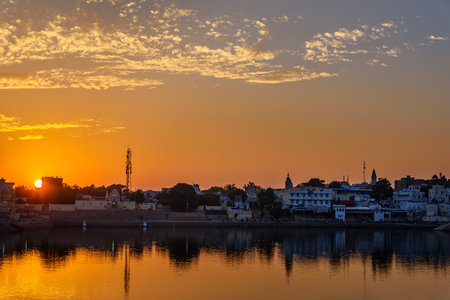 Ghats at Pushkar holy lake at sunset in Rajasthan. Indiaのeditorial素材