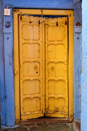 Old wood carved door in the Blue City of Jodhpur. Rajasthan. Indiaの写真素材