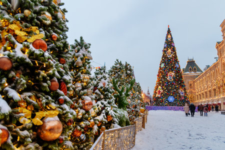 Moscow, Russia - January 26, 2019: Beautiful decorated and christmas tree with illumination on Red Square near GUM in the eveningのeditorial素材